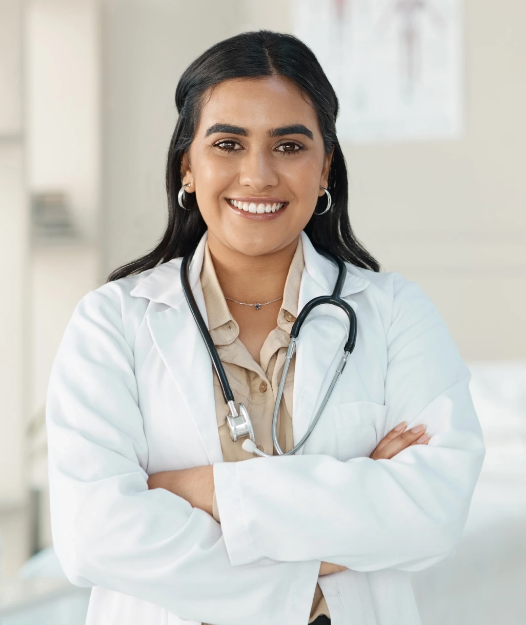 shot of an attractive young doctor standing alone